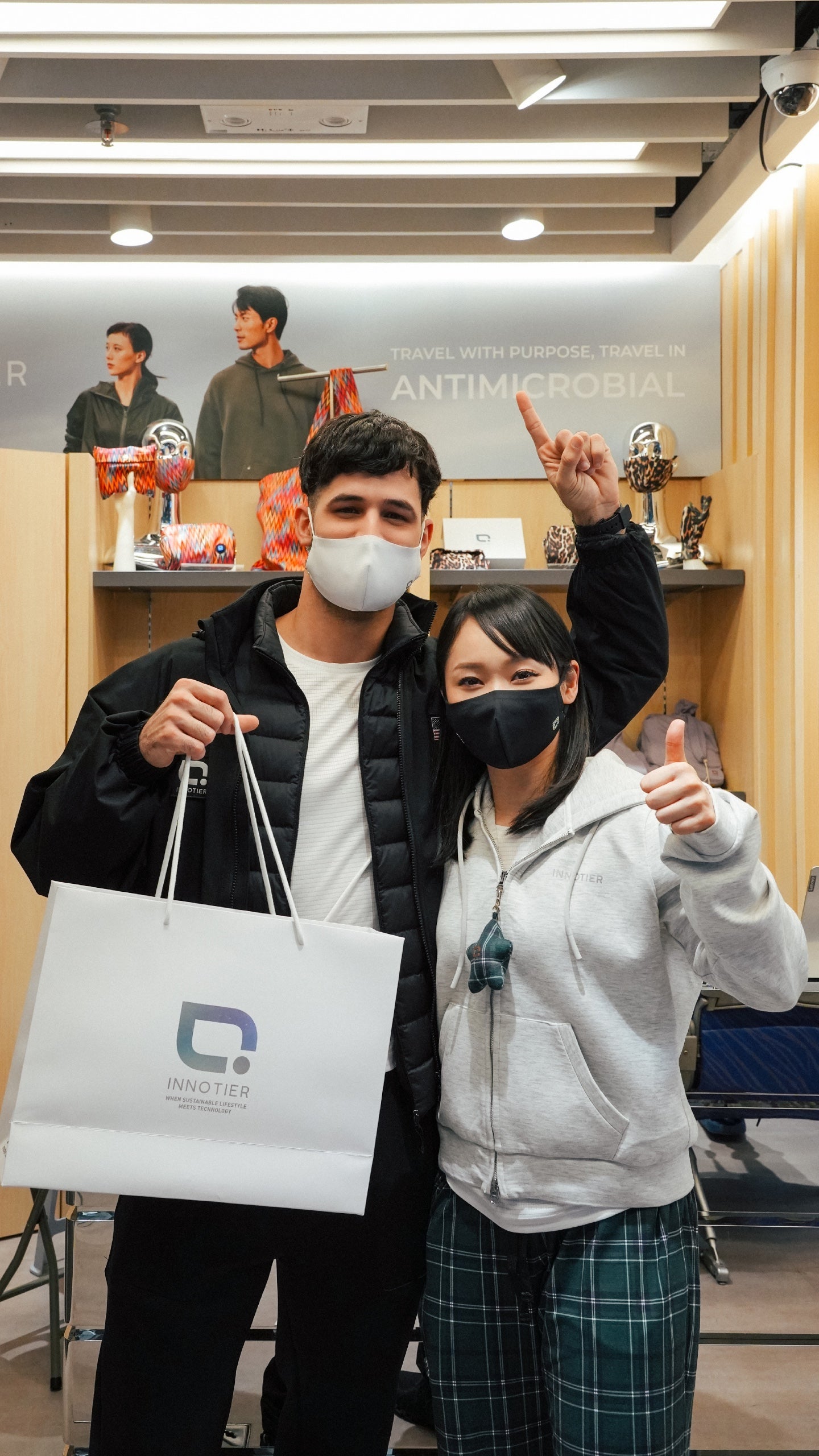 Olympic Karate Athletes Ariel Torres and Grace Lau visit INNOTIER’s Airport Store