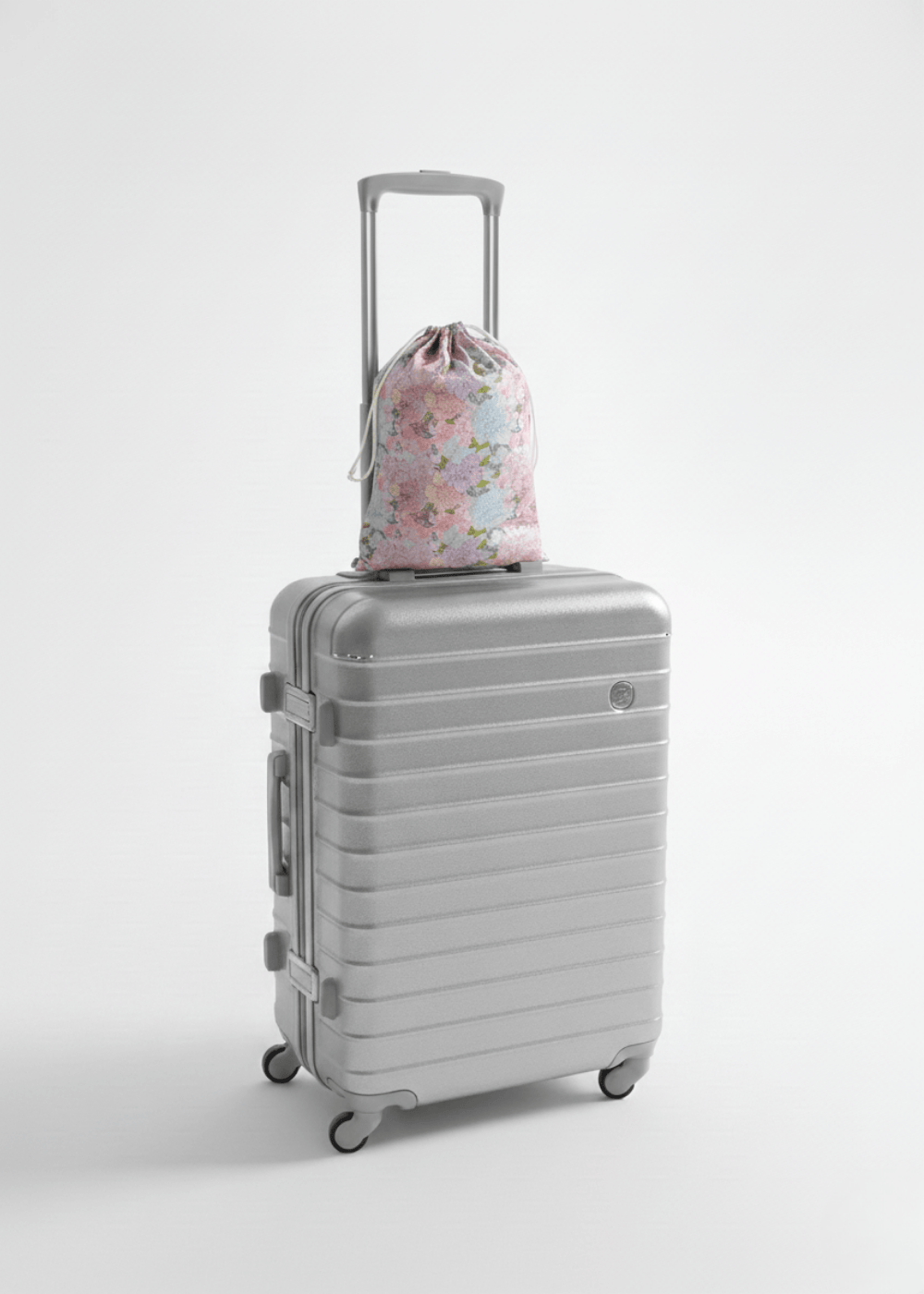 A travel set resting on top of a suitcase.